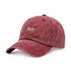 Red baseball cap with a logo on a white background