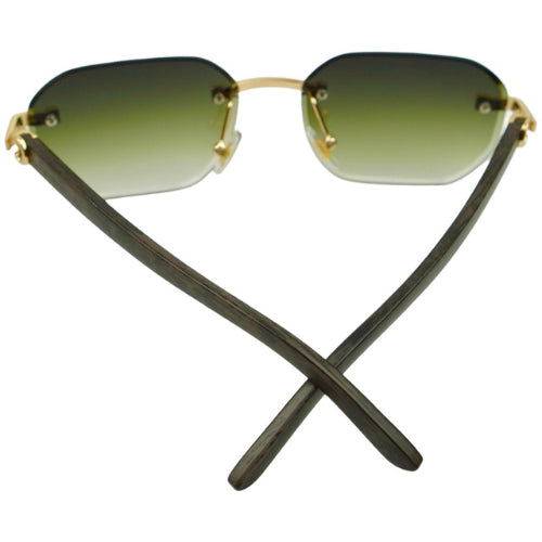 Sunglasses with gold frames and green gradient lenses on a white background