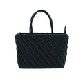 Black woven handbag on a white background