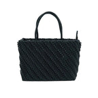 Black woven handbag on a white background