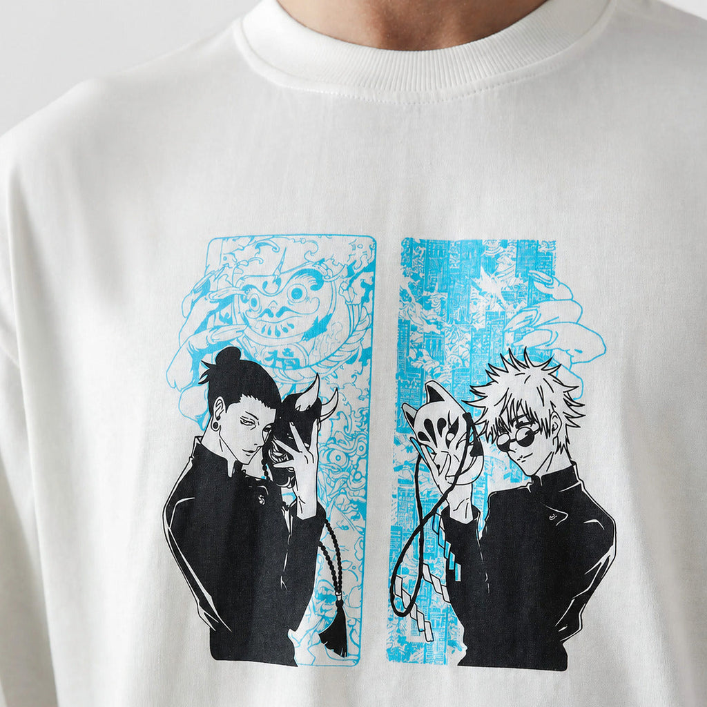 White t-shirt with black and blue graphic design of two characters on a white background