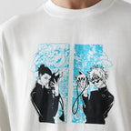 White t-shirt with black and blue graphic design of two characters on a white background