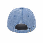 Blue denim cap on a white background