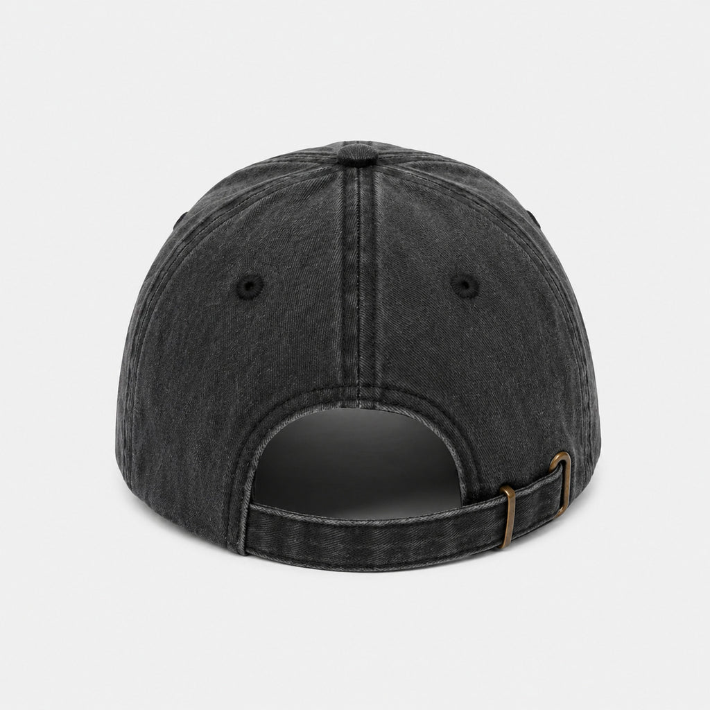 Black baseball cap on a light gray background