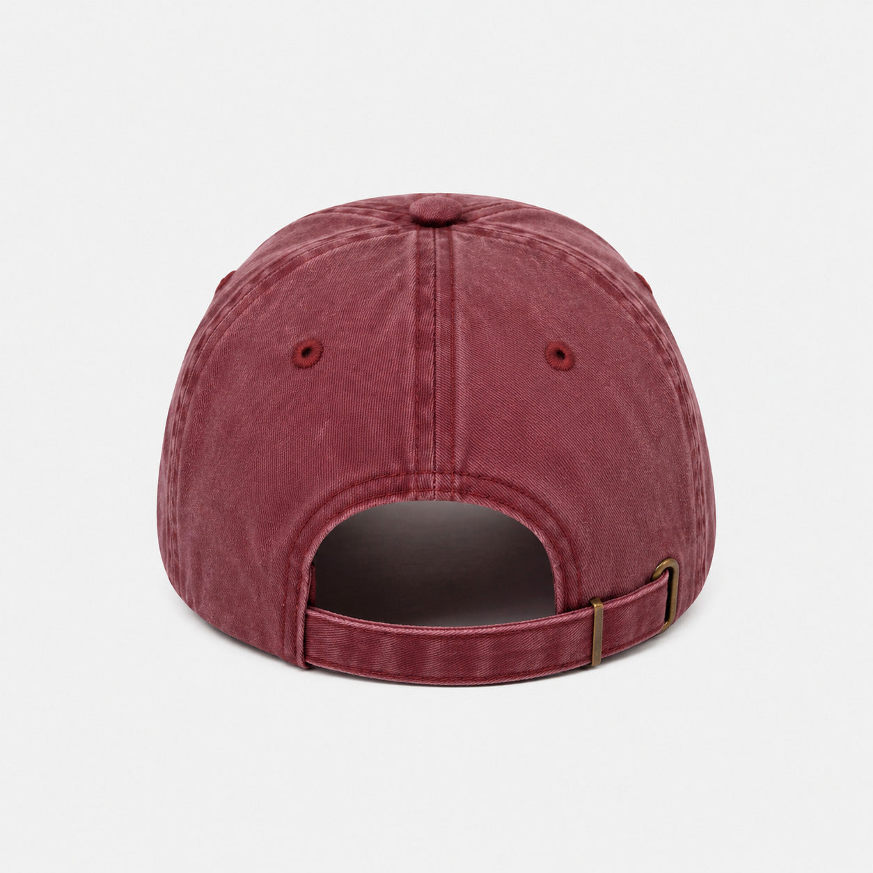 Maroon baseball cap on a light gray background