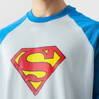 Person wearing a shirt with a Superman logo