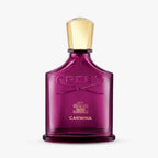 Purple Creed Carmina perfume bottle on a white background