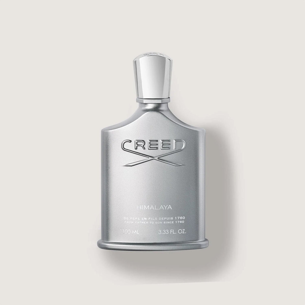 Silver Creed Himalaya perfume bottle on a light gray background