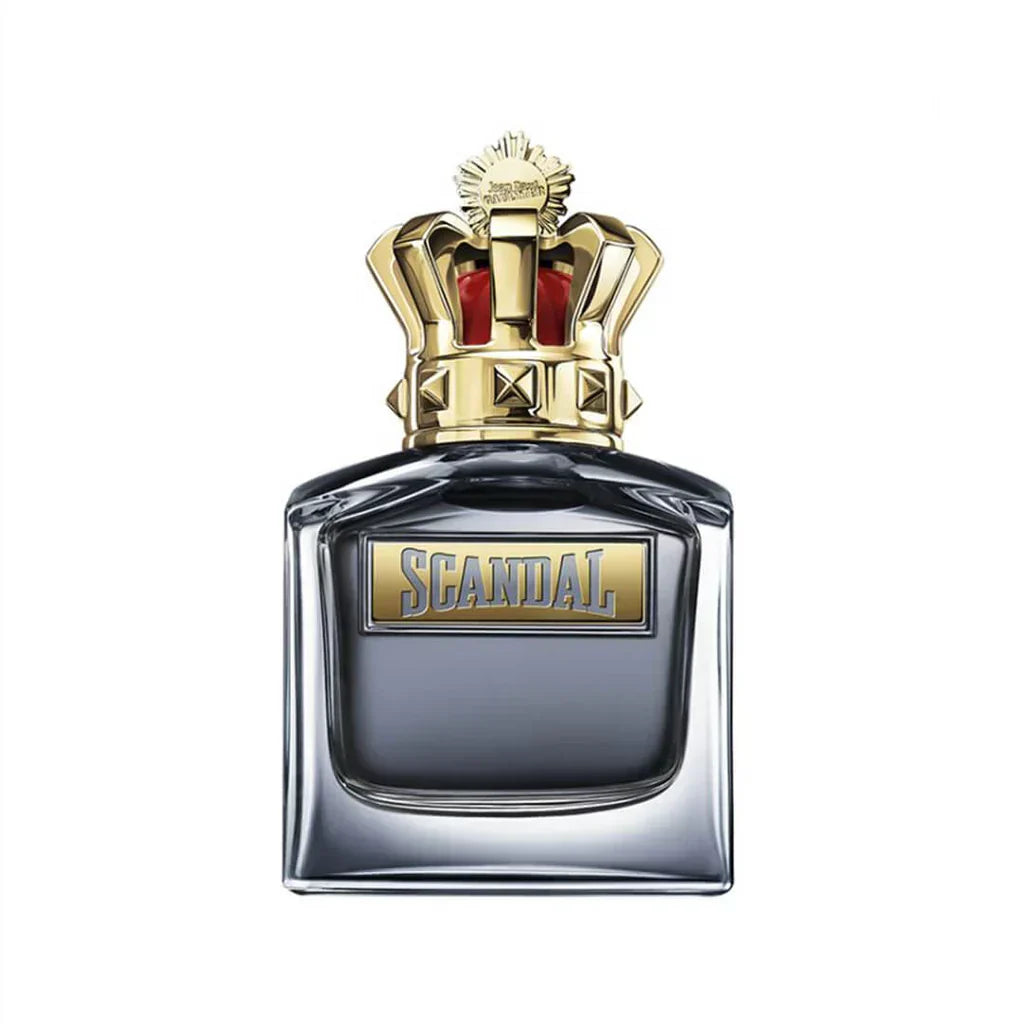 Perfume bottle with gold crown and 'Scandal' label on a white background