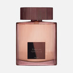 Tom Ford Cafe Rose perfume bottle on a light beige background