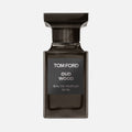 Tom Ford Oud Wood perfume bottle on a white background