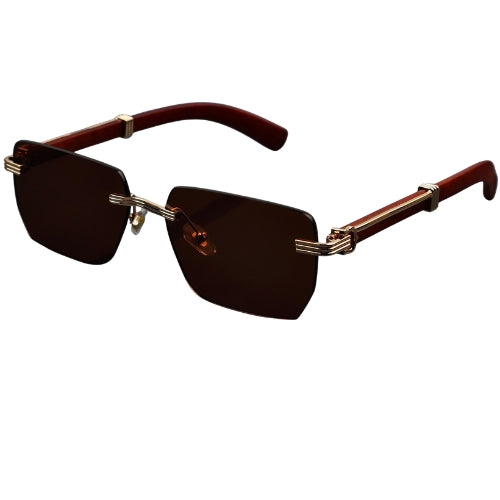 Sunglasses with brown lenses and gold frames on a white background