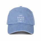 Blue cap with 'The Good Vibes Only' text on a white background