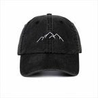 Black cap with mountain logo on a white background