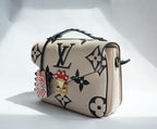 Louis Vuitton LV Crafty Pochette Metis Cream Embossed Leather M45384