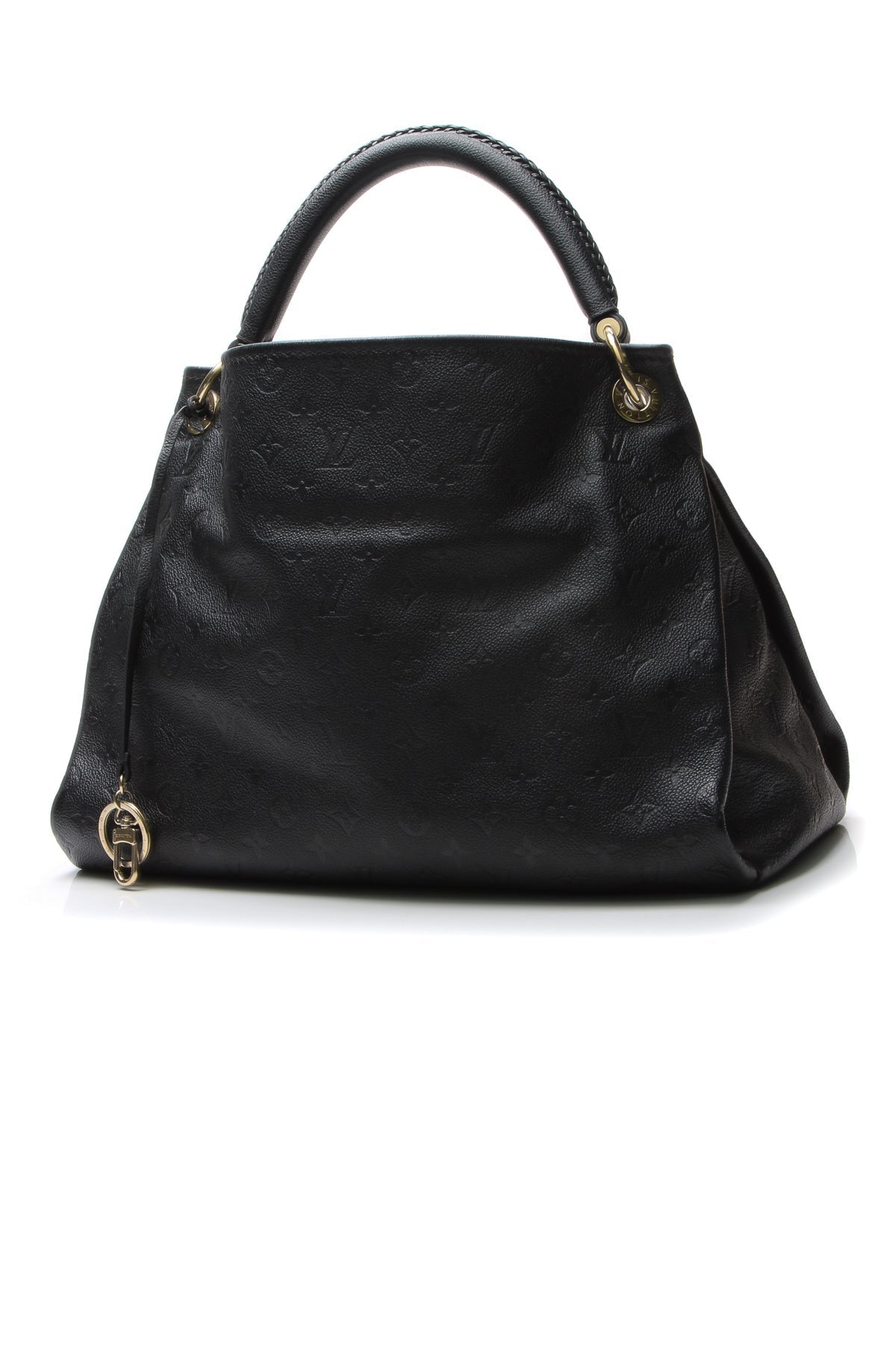 The bag carried on the forearm, highlighting its single braided strap