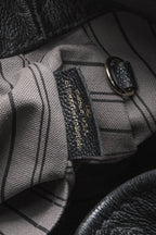 The spacious interior, showing the flat zipped pocket and double pocket