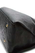 A front view of the bag as it is worn on the shoulder