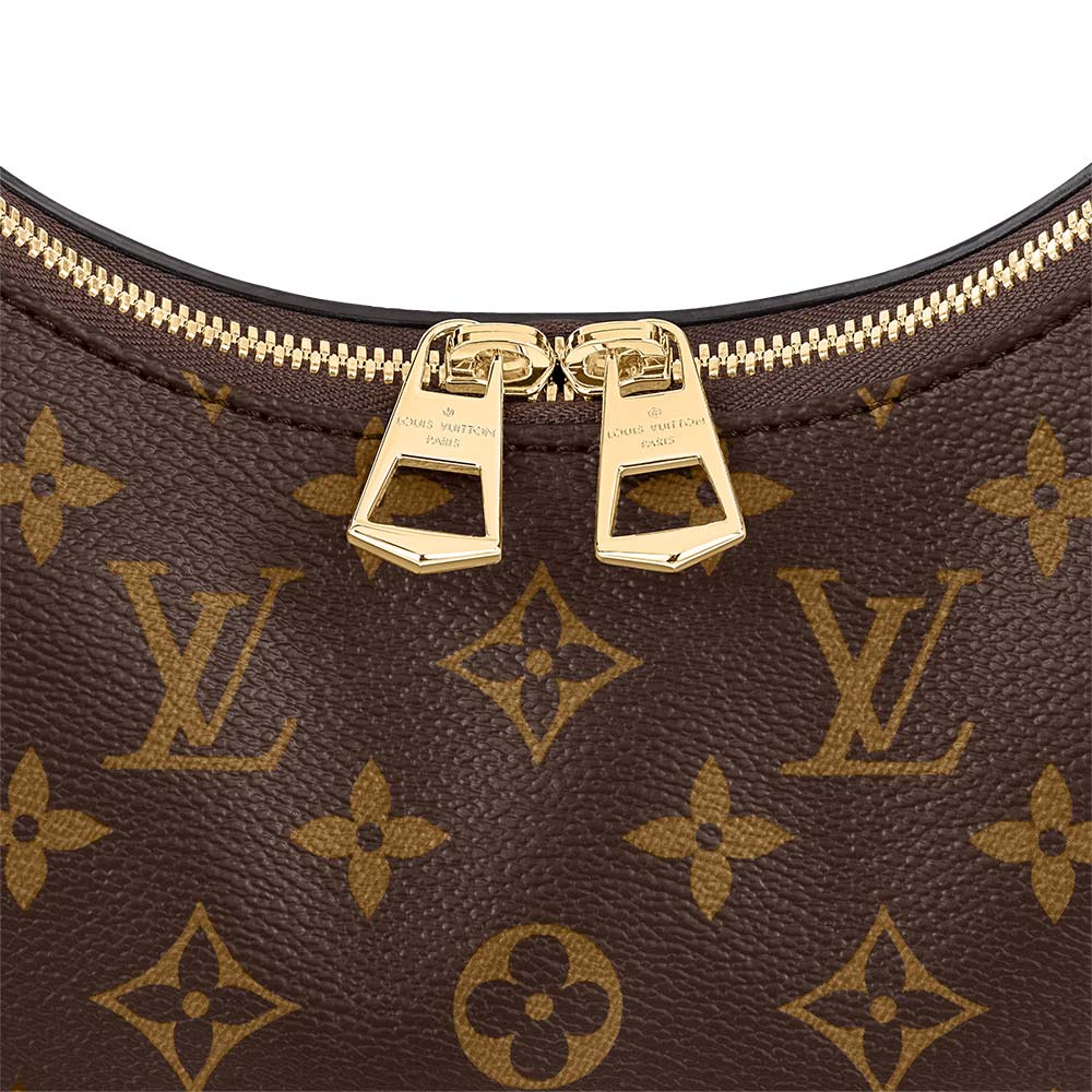 A close-up of the removable strap and its hardware