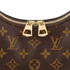 A close-up of the removable strap and its hardware