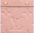 A close-up image showing the embossed monogram pattern on the leather