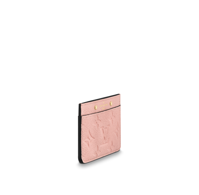 The card holder with several cards inside, demonstrating its capacity