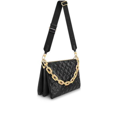The Louis Vuitton Coussin MM shown with its stylish removable chain