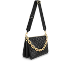 The Louis Vuitton Coussin MM shown with its stylish removable chain