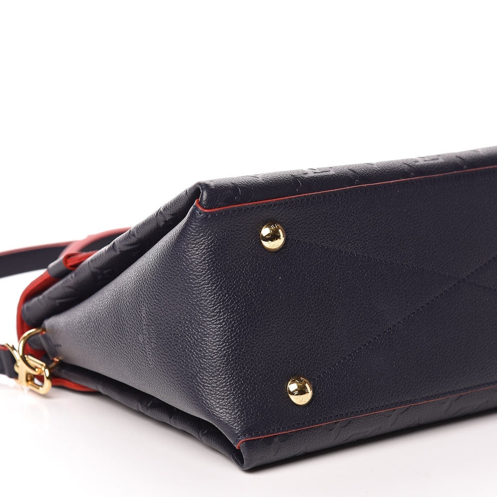 A detailed shot of the bag's gold-color clasp