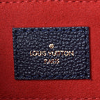 Side profile of the Georges MM, showing the navy blue color