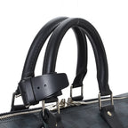 The bag in a travel setting, placed next to a suitcase