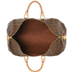 The bag with both its double handles and the removable strap