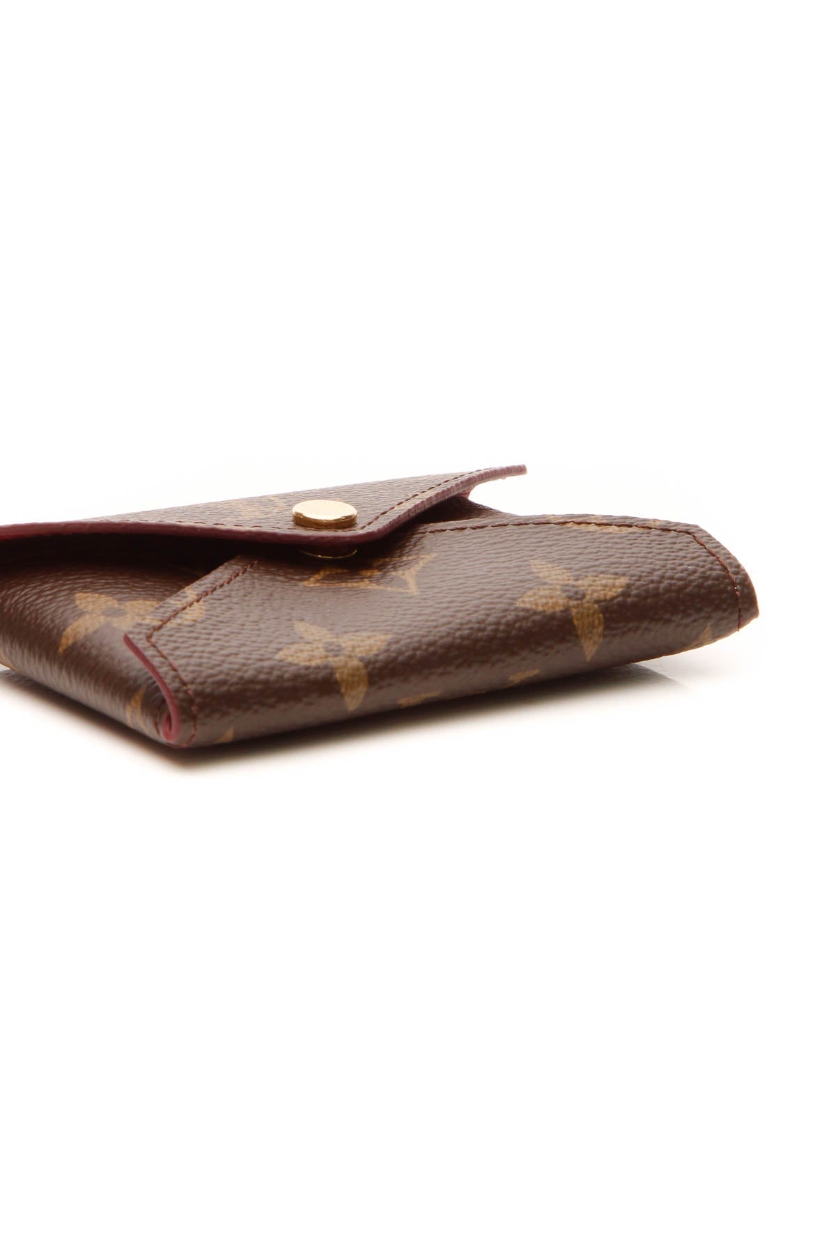 The pouch being carried as a clutch