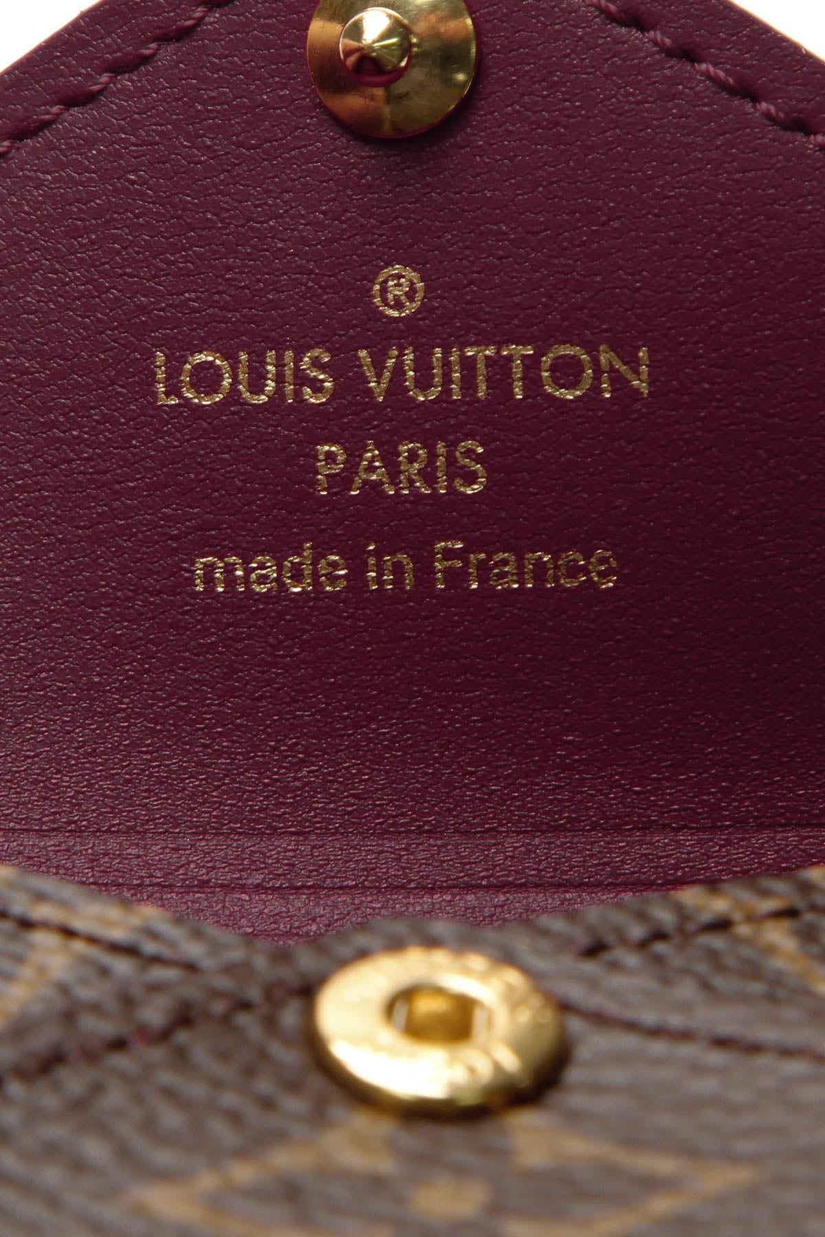 A detail shot of the stitching along the pouch's flap