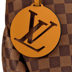 A detailed shot of the two metallic zipper pullers