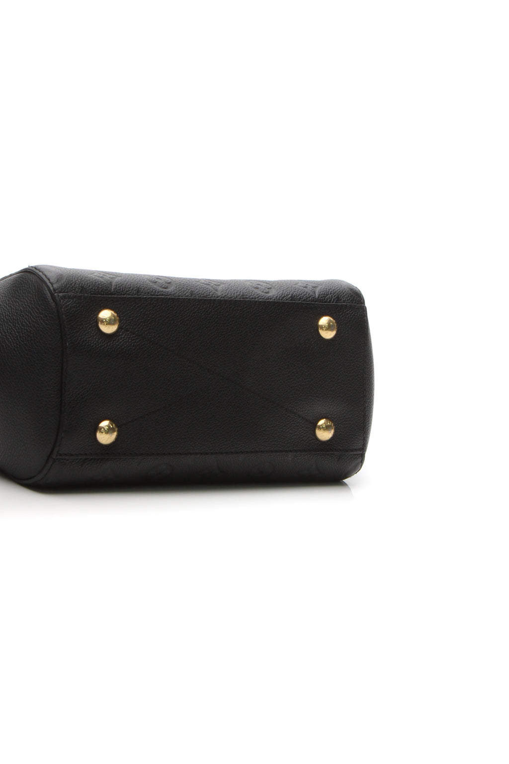 A view of the bag's base, showing the protective metal studs