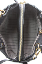 A close-up of the Monogram Empreinte leather pattern.