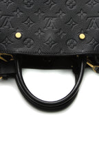 The bag being carried on the forearm