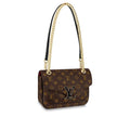 A front view of the Louis Vuitton Passy in Monogram canvas