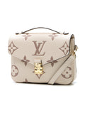 A detailed shot showing the contrast between the cream and dove colors in the leather