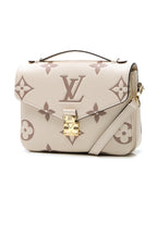 A detailed shot showing the contrast between the cream and dove colors in the leather