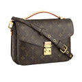 A low-angle view of the Pochette Metis handbag