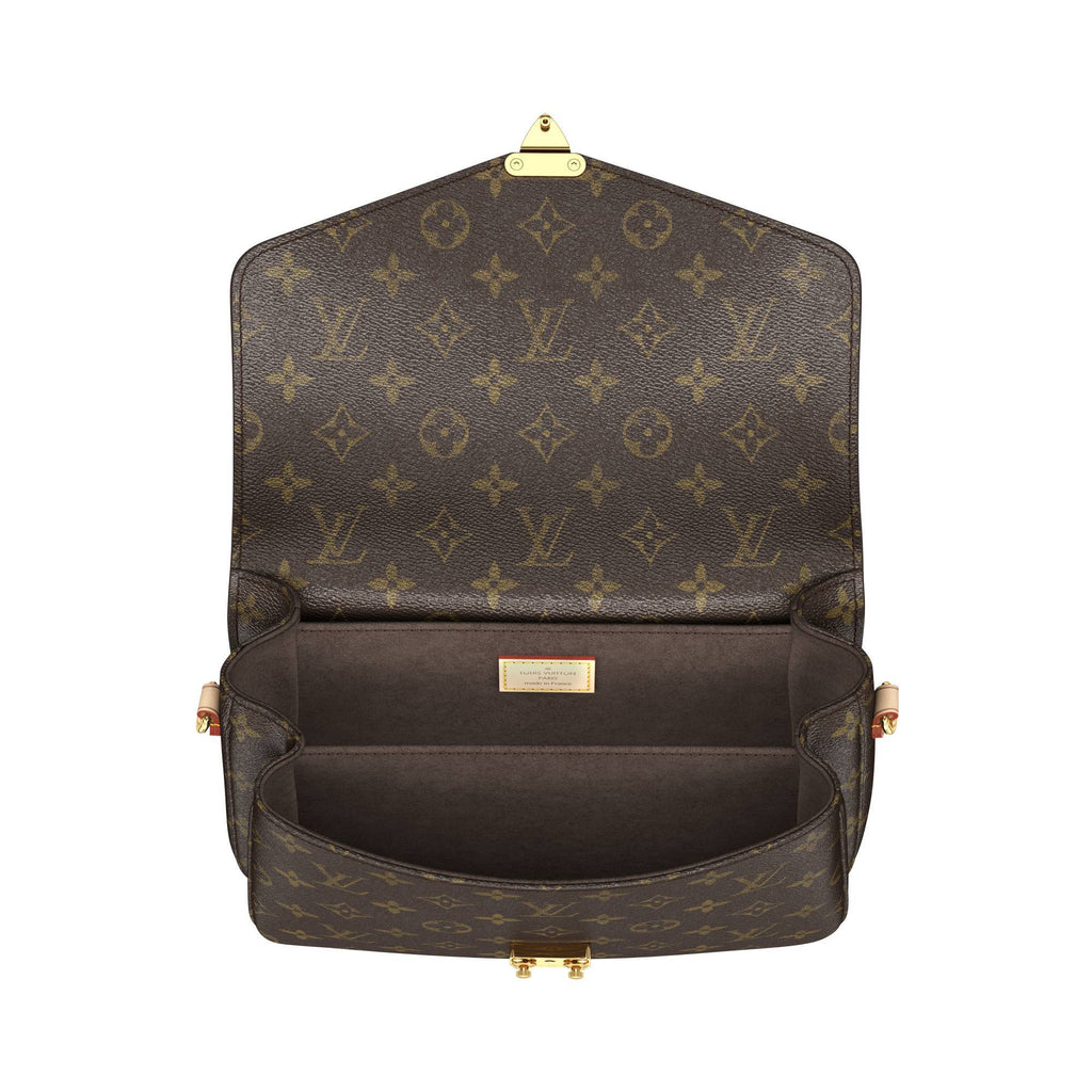 A close-up of the Monogram canvas pattern