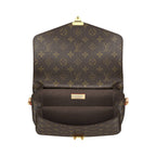 A close-up of the Monogram canvas pattern