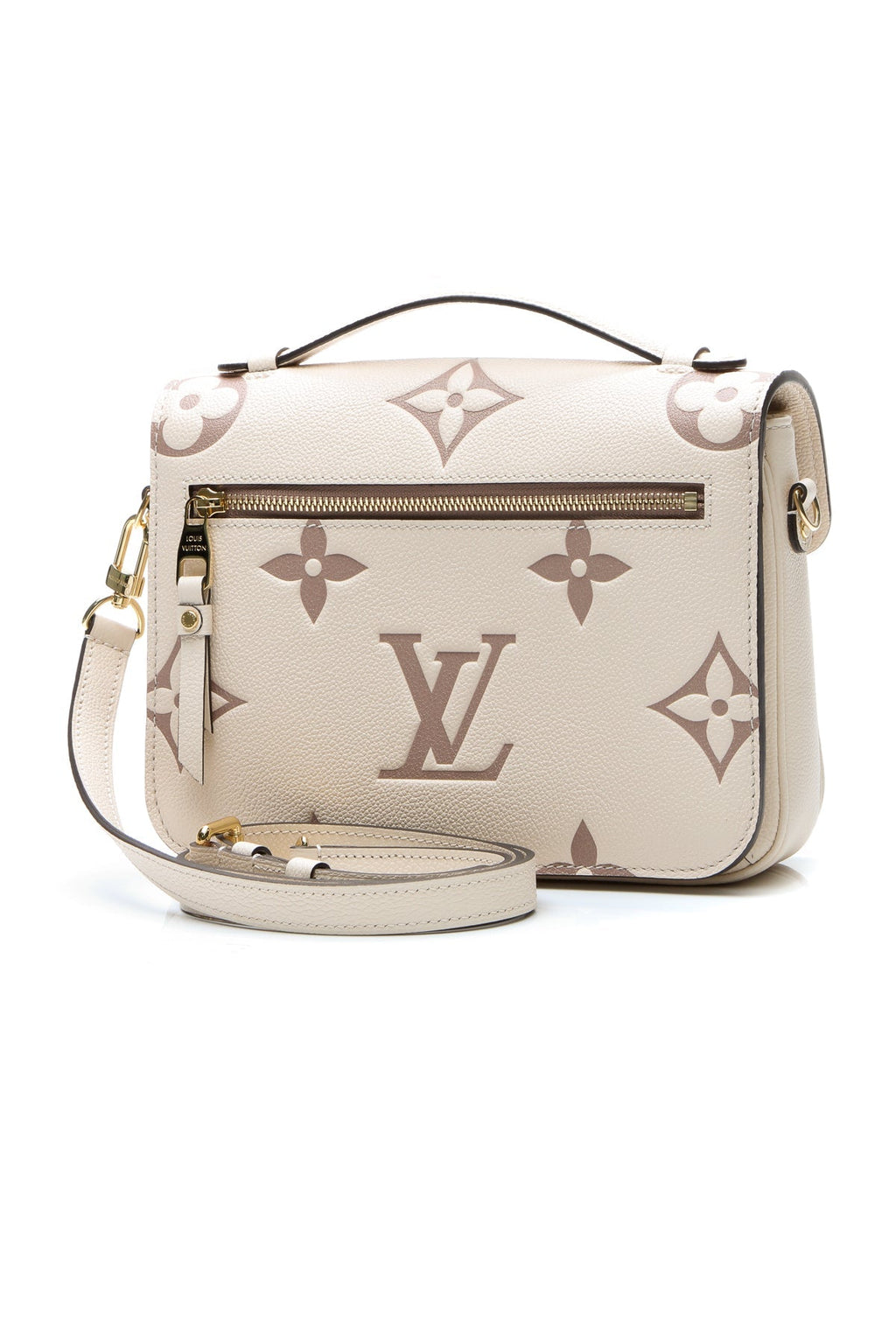The handbag displayed upright on a flat surface