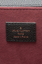 The bag displayed with its original dust bag
