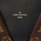 A close-up of the double zipper pullers